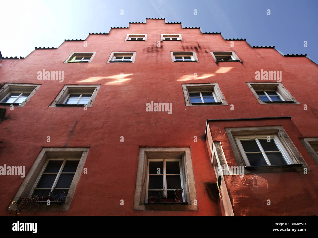 Red facade of an old house, crow-stepped gable, Regensburg, Lower Bavaria, Germany, Europe Stock Photo