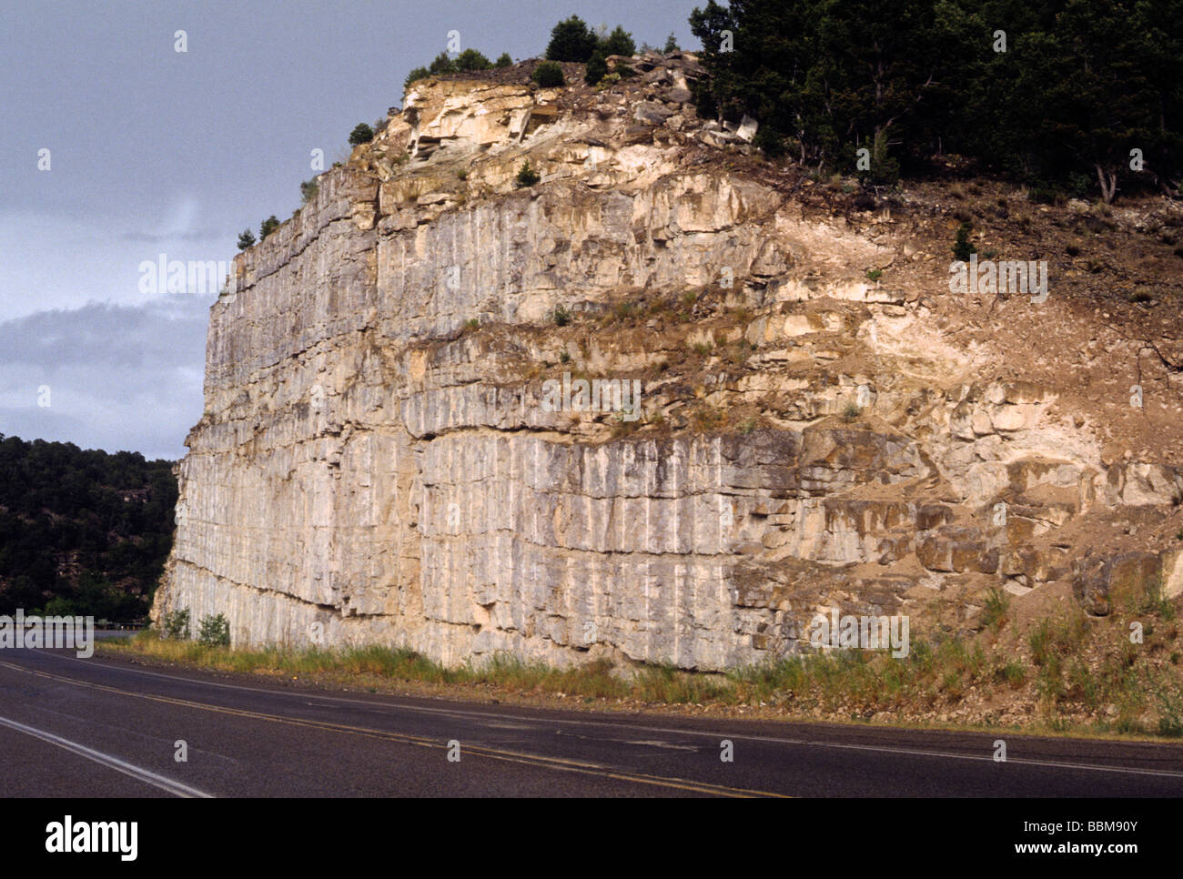 rock strata geology science nature cliff cut road layer Stock Photo