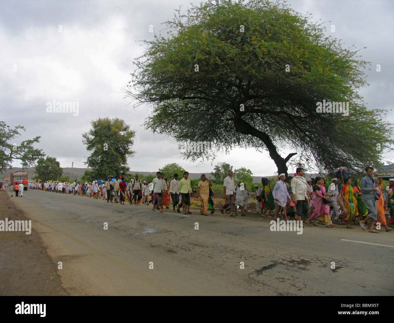 Warkaris walking during Pandharpur Yatra  at Alandi, Maharashtra, India Stock Photo