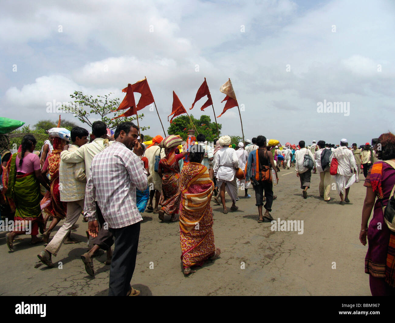 Warkaris walking during Pandharpur Yatra  at Alandi, Maharashtra, India Stock Photo