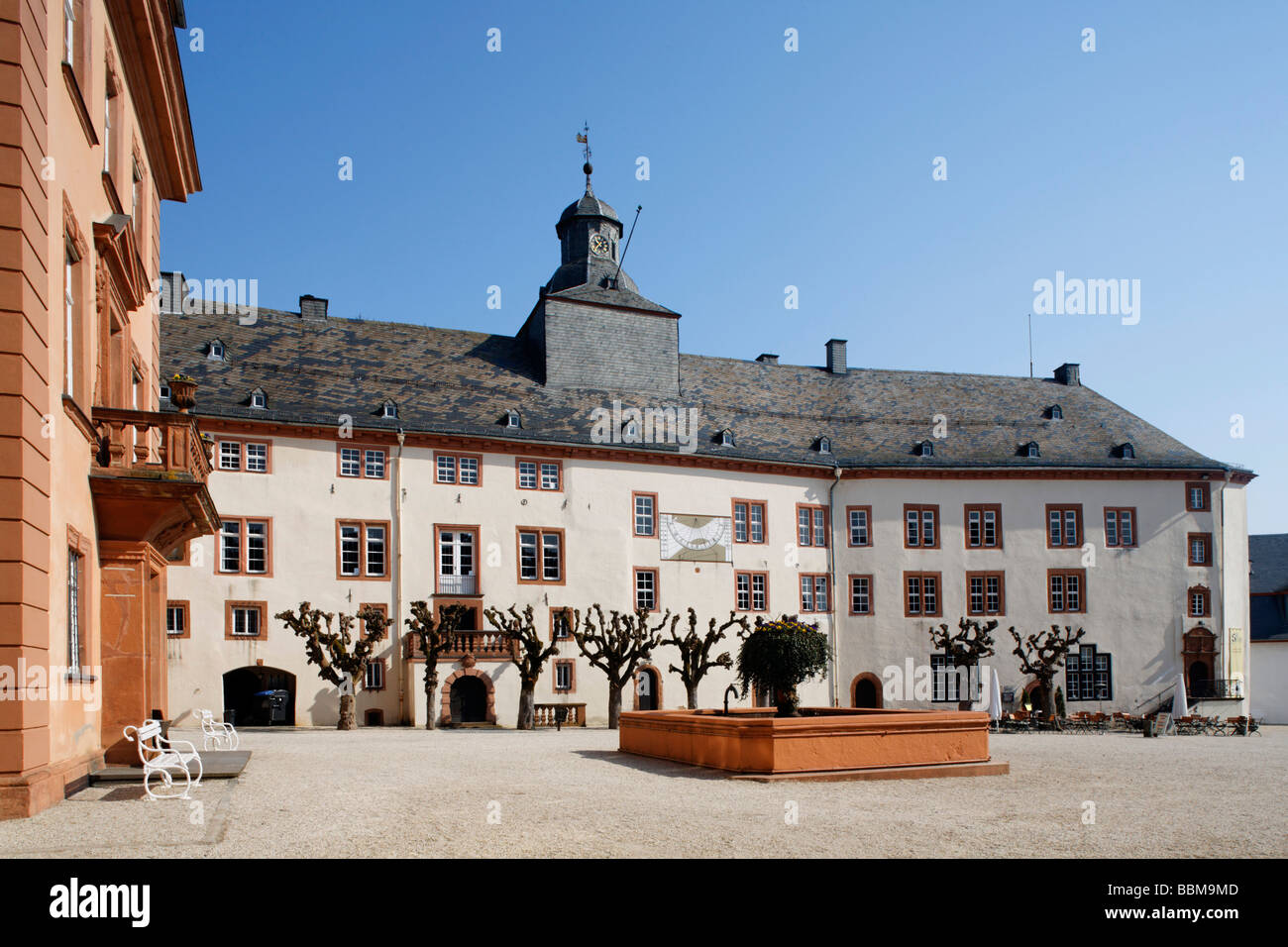 Castle square with fountain and the north wing, Berleburg Castle, Bad Berleburg, district of Siegen-Wittgenstein, Rothaarsteig, Stock Photo