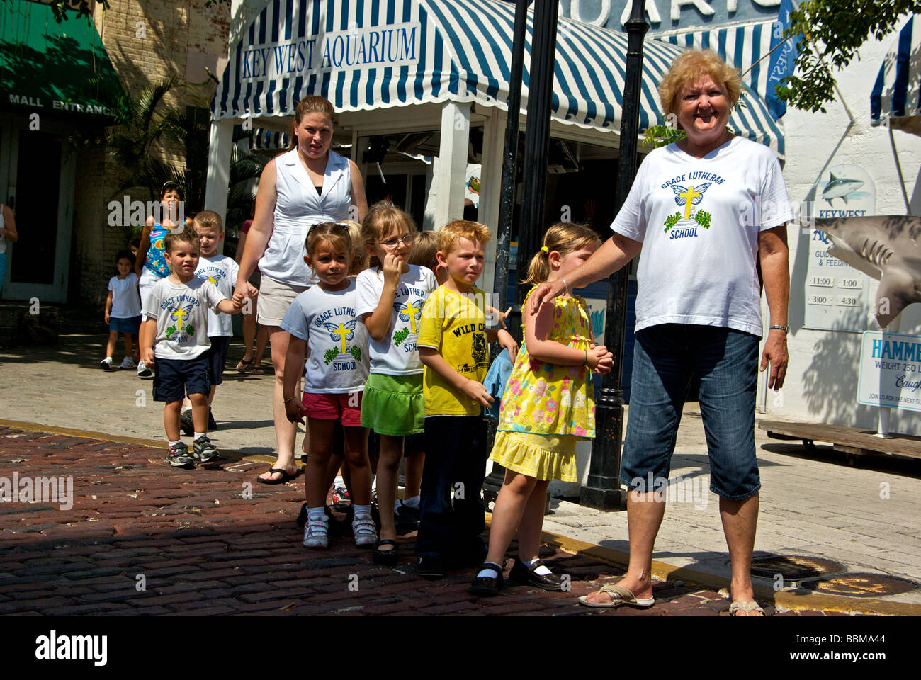 Elementary school students and their teachers lining up after field