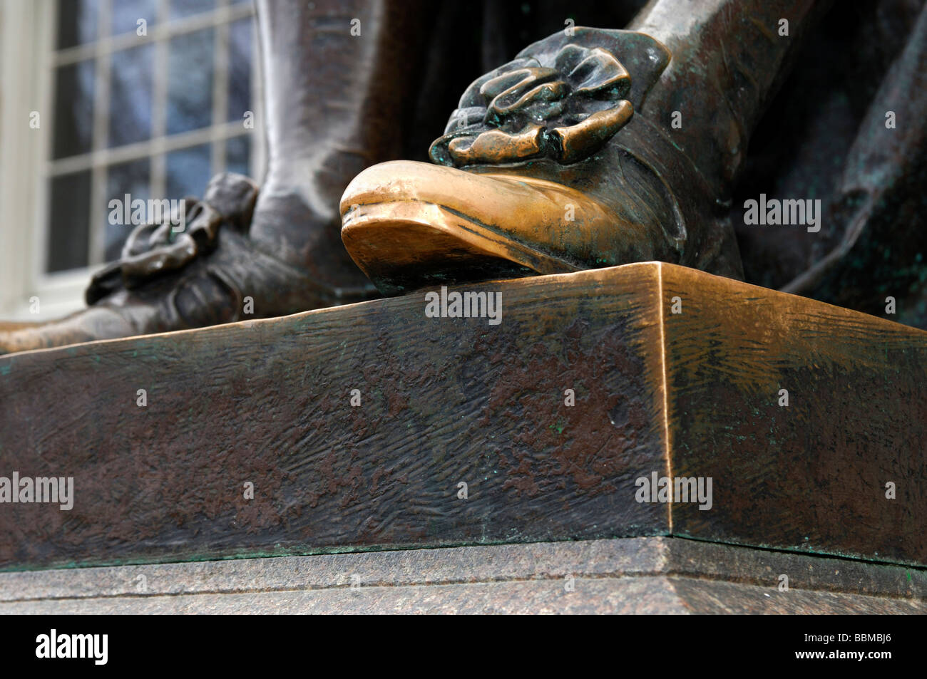 Bare left shoe at the John Harvard statue by Daniel Chester French, the ...