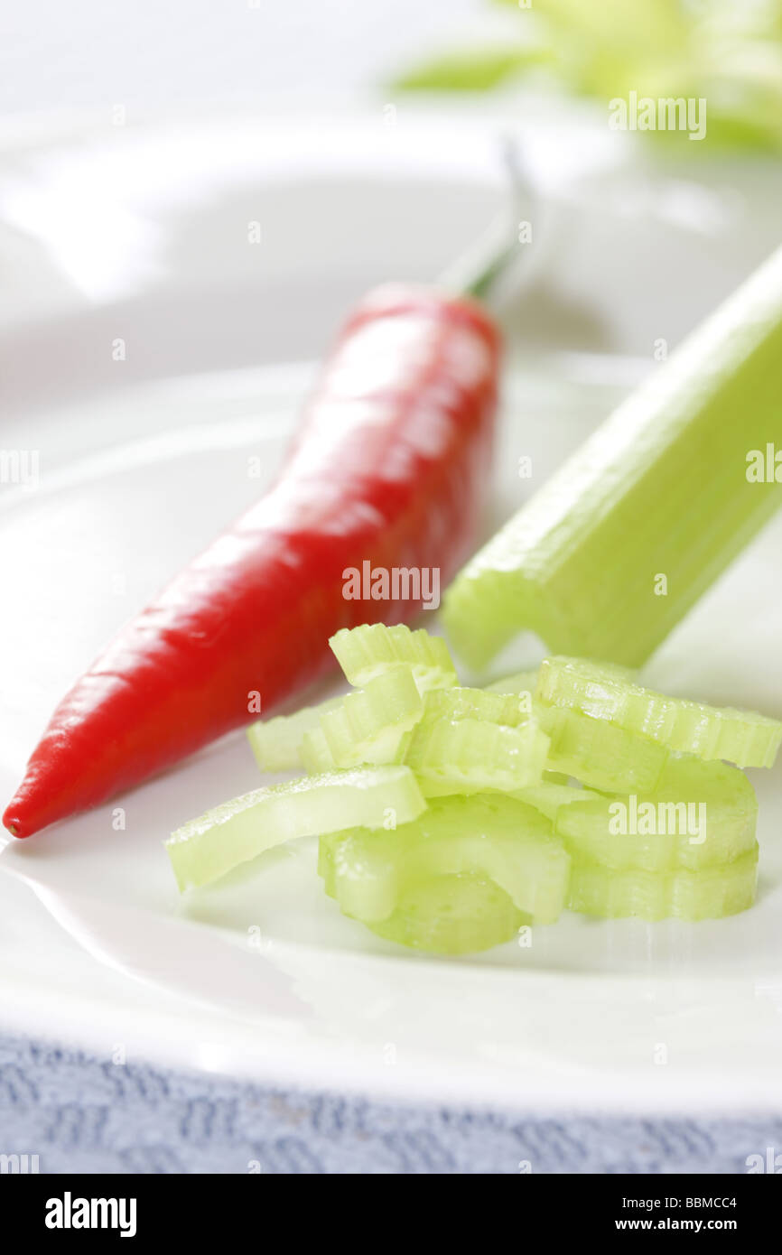 Red Chilli with Celery Stock Photo Alamy