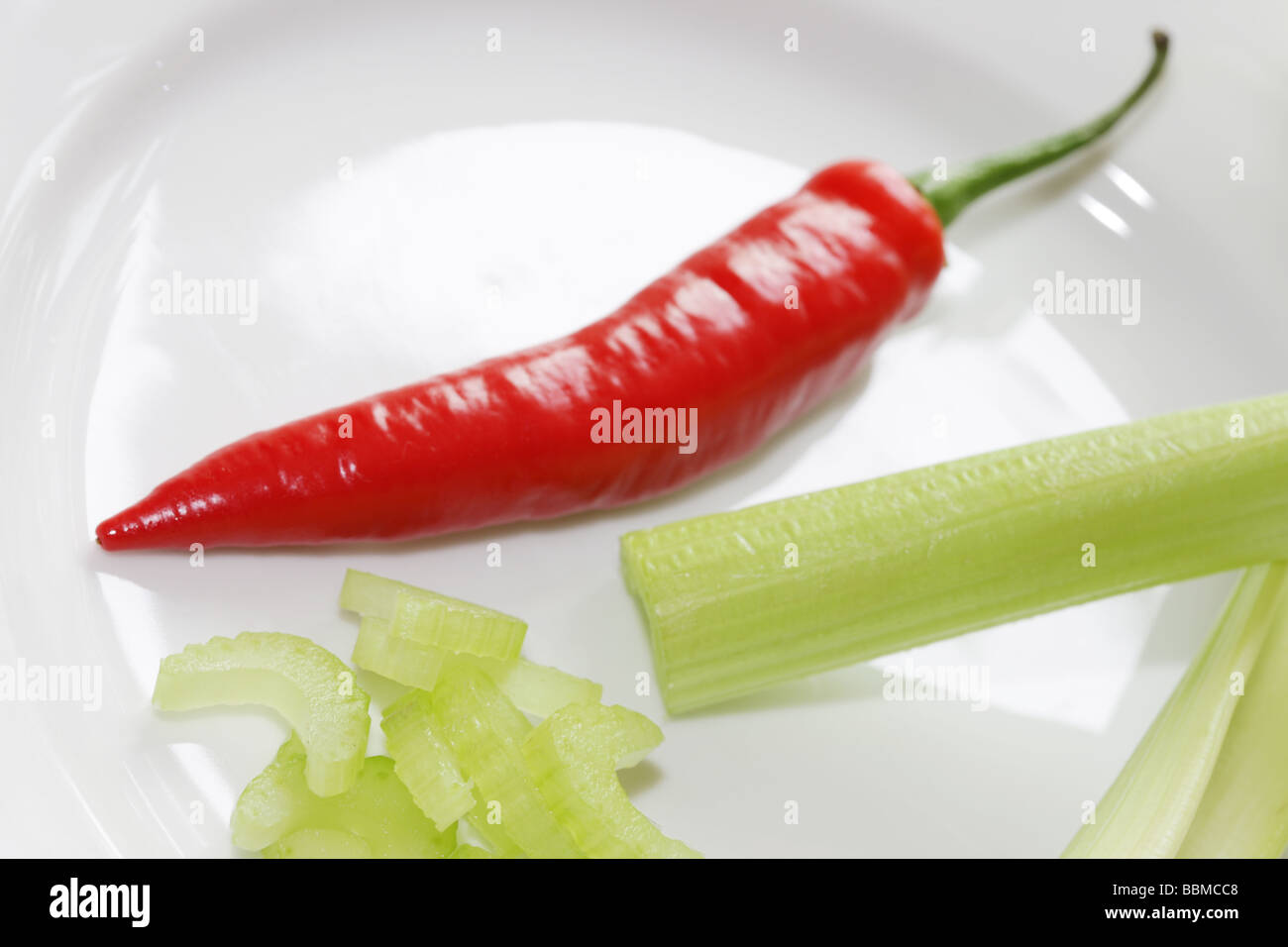 Red Chilli with Celery Stock Photo Alamy