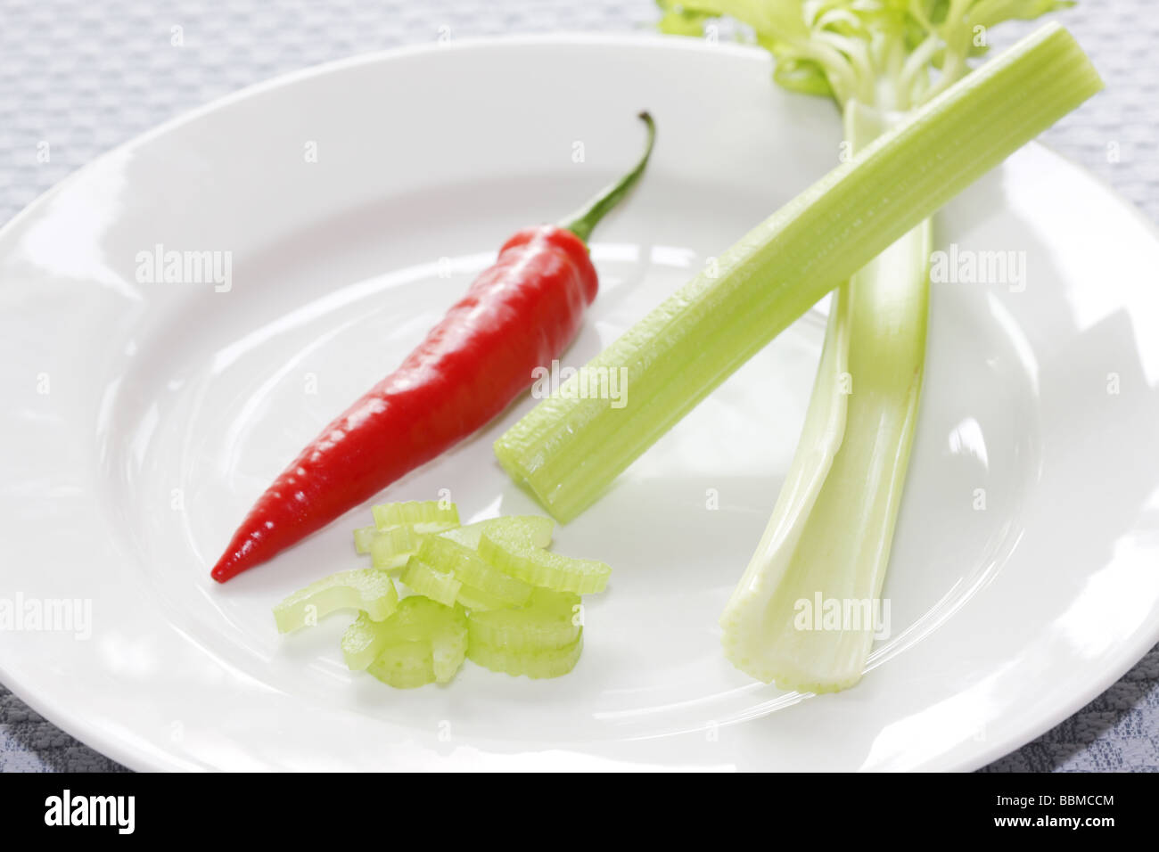 Red Chilli with Celery Stock Photo Alamy