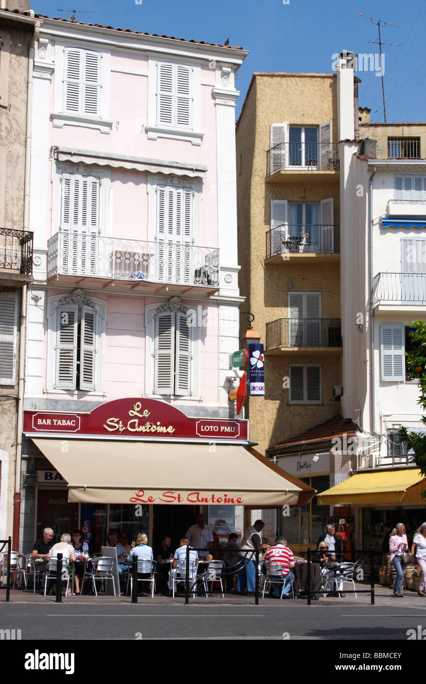 Tourists enjoying an early morning coffee in Cannes,South of France Stock Photo Alamy