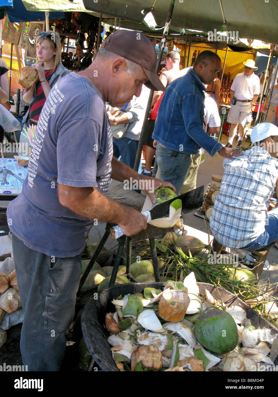 Cutting a coconut Stock Photo