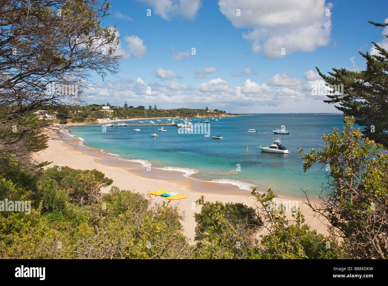 Australia, Victoria.  The fine sandy beach at Portsea with boats anchored in sheltered Port Phillip Bay. Stock Photo