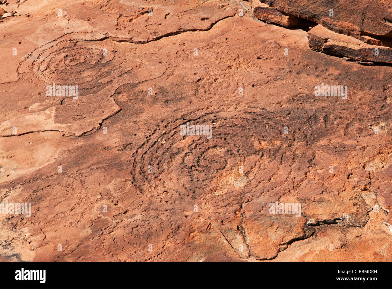 Australia, Northern Territory. Ancient Aboriginal art of the Aranda people at Wallace Rockhole. Stock Photo