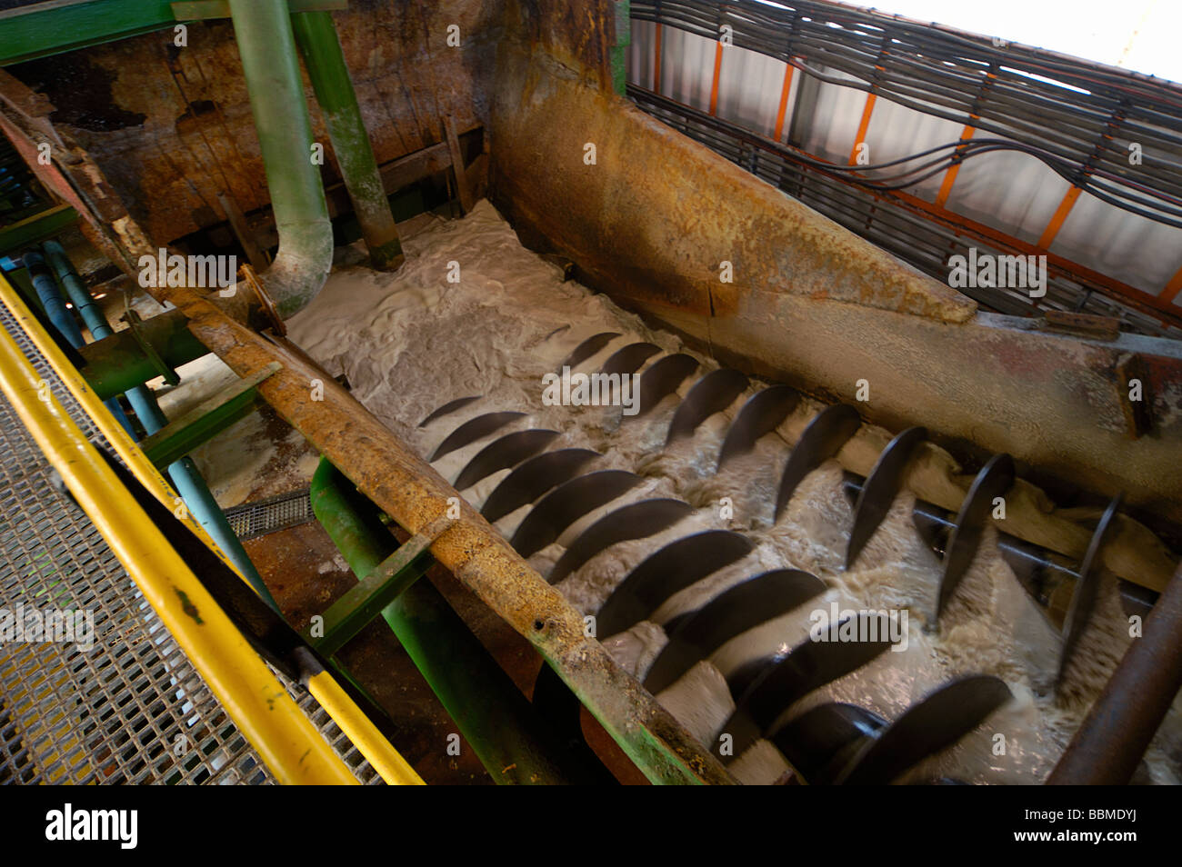 Salt from evaporated sea water in washing plant Stock Photo Alamy