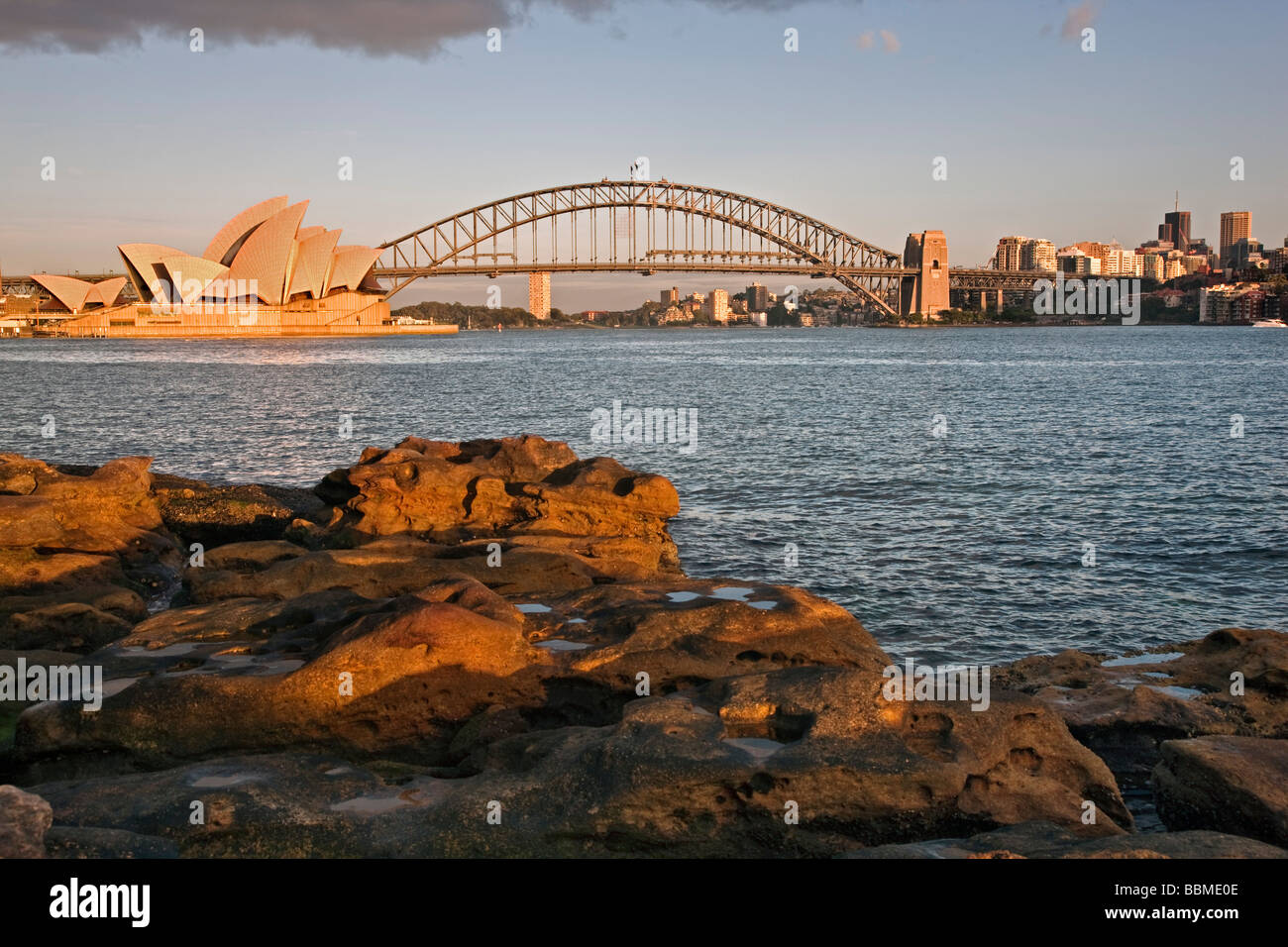 Australia New South Wales. Sydney Opera House and Harbour Bridge at sunrise. Stock Photo