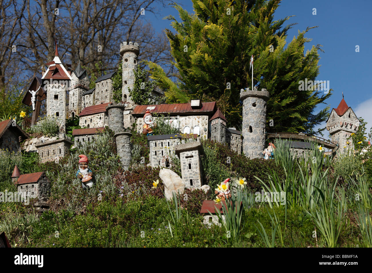 Garden gnomes and model castles in a garden in Sarleinsbach, Muehlviertel, Upper Austria, Austria, Europe Stock Photo