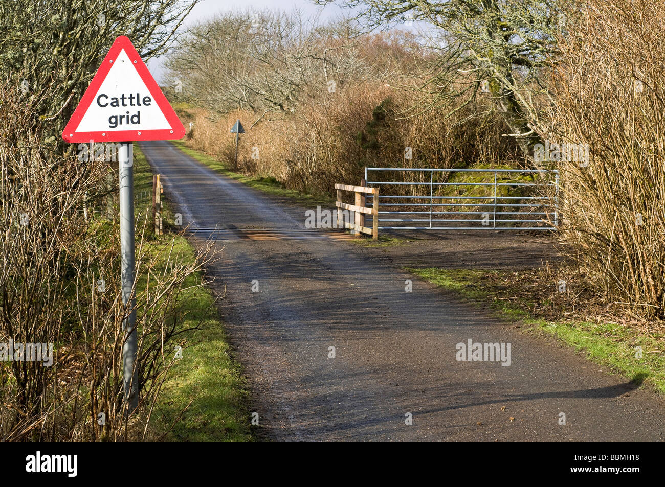 dh Scotland Country road ROADSIGN UK Caithness cattle grid gate motoring signpost roadsigns empty Stock Photo