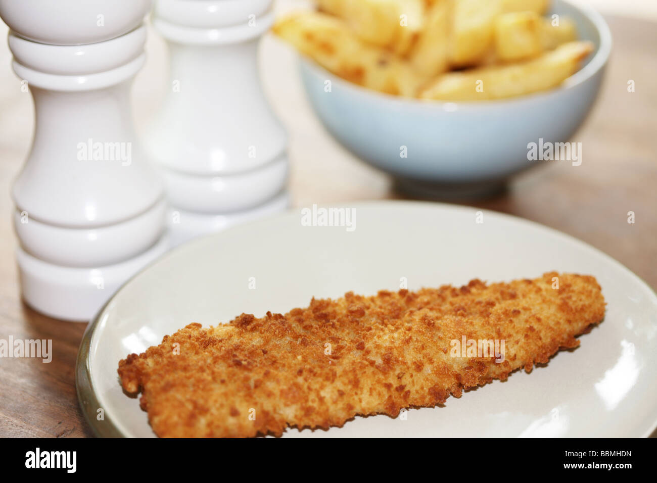 Breaded Haddock with Chips Stock Photo Alamy