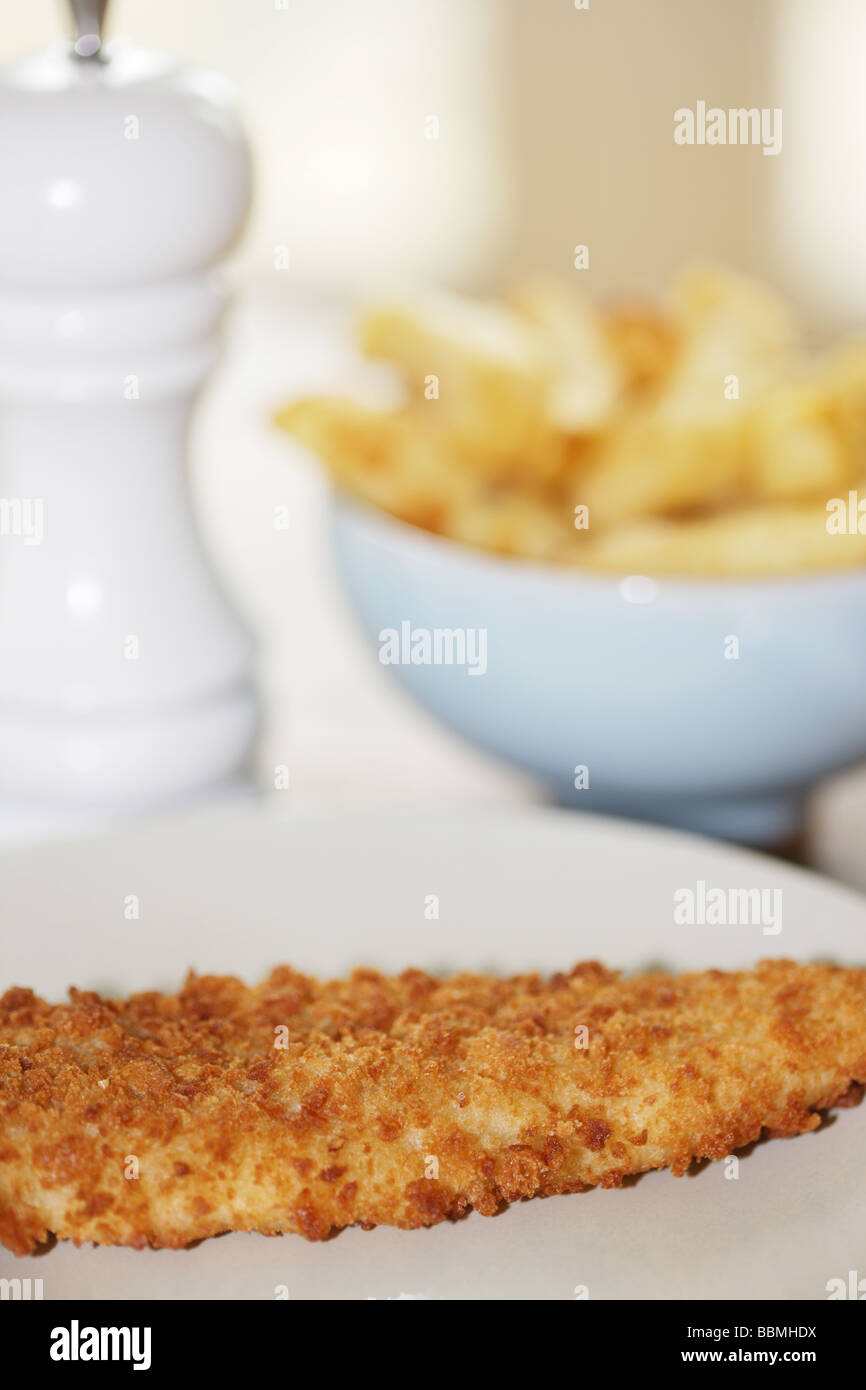 Breaded Haddock with Chips Stock Photo Alamy
