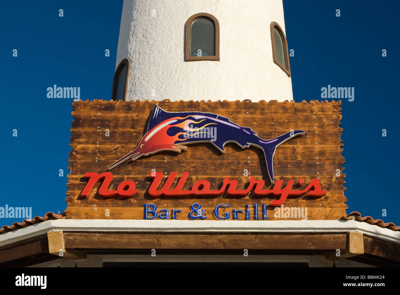 Swordfish sign at faux lighthouse at marina restaurant at Cabo San Lucas Baja California Sur Mexico Stock Photo