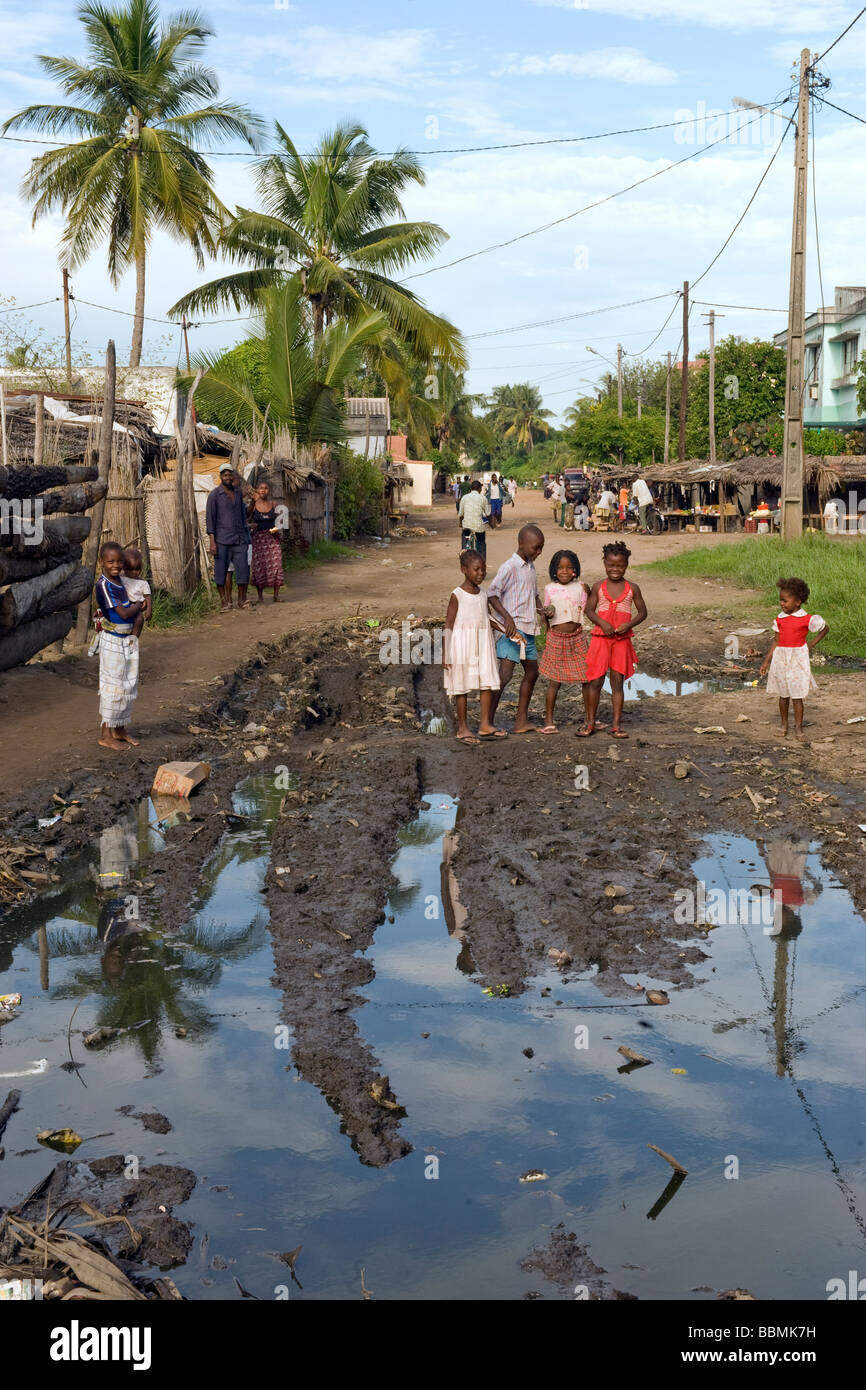 Malaria mosquitoes find suitable breeding grounds in water filled potholes Quelimane Mozambique Stock Photo
