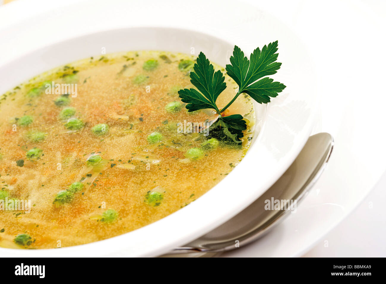 Oily vegetable soup with peas Stock Photo