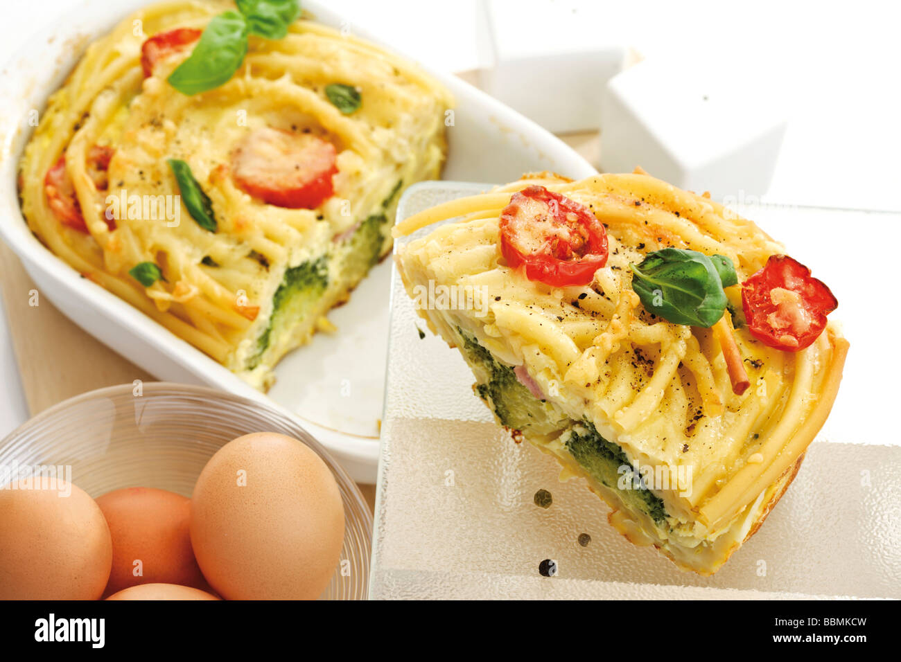 Pasta bake, macaronicasserole with broccoli and chicken eggs Stock