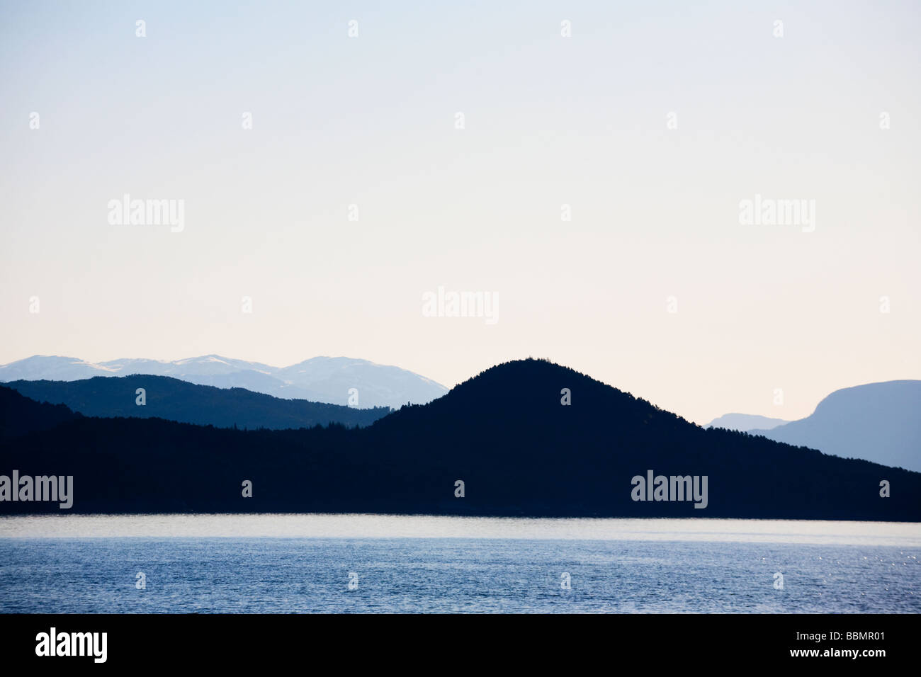 Norwegian fjord and mountain silhouette Stock Photo