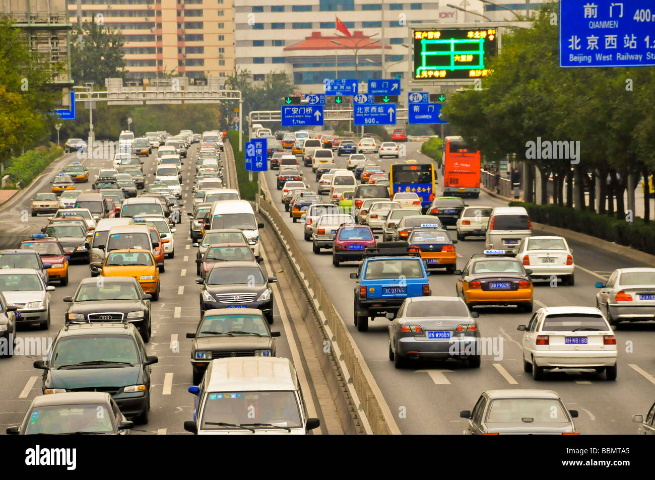 Traffic on highway next to the Forbidden city Beijing China Stock Photo