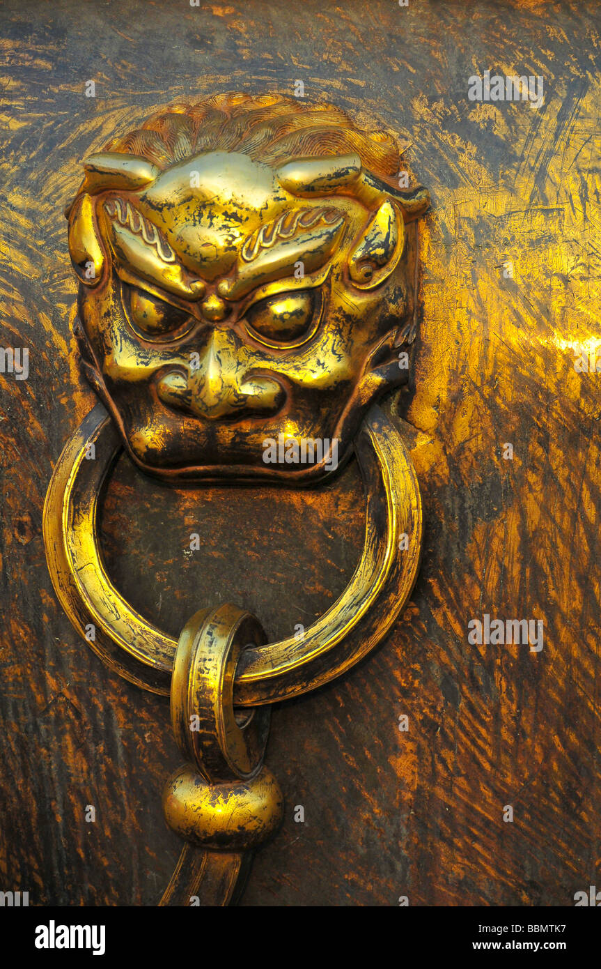 Oriental Symbolic Decorative Handle on a pot in the Forbidden city Beijing China Stock Photo