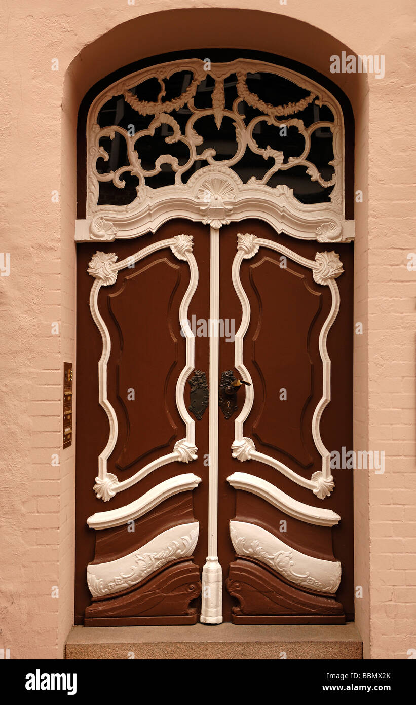 Old decoratively adorned door, Lueneburg, Lower Saxony, Germany, Europe Stock Photo