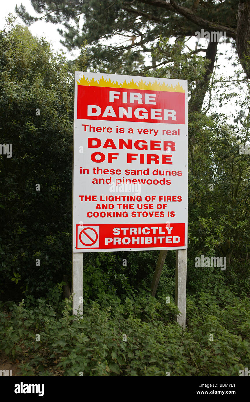 A Fire Danger Sign in a Forest. Stock Photo
