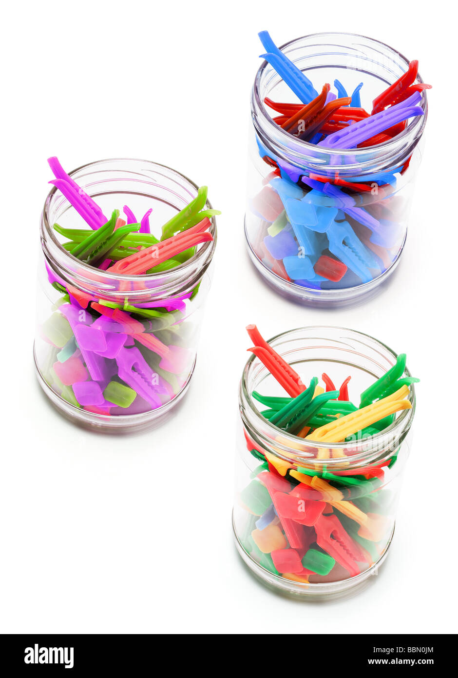 Clothes Pegs in Glass Jars Stock Photo