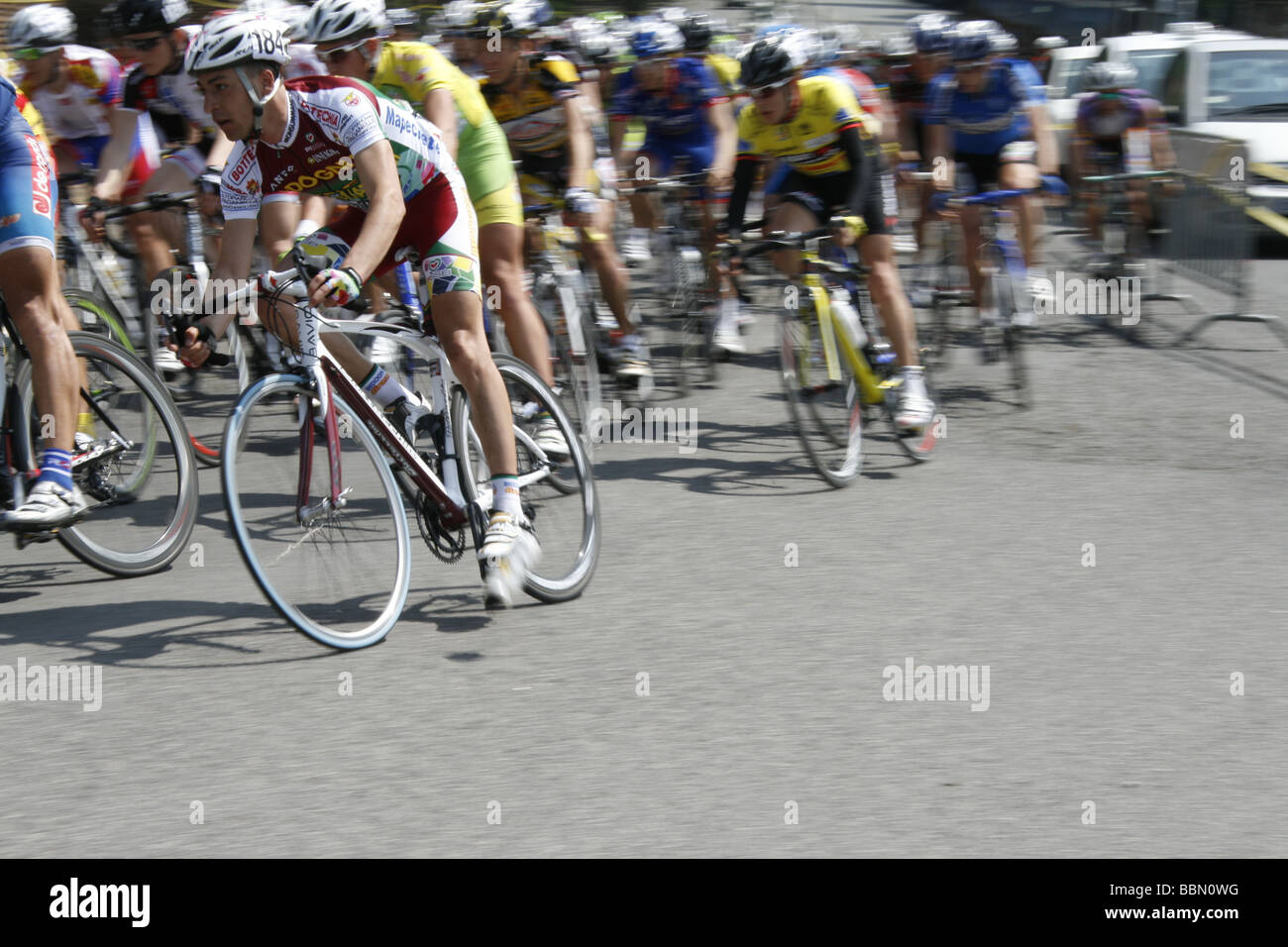 professional bike riders in road street race in city town Stock Photo ...