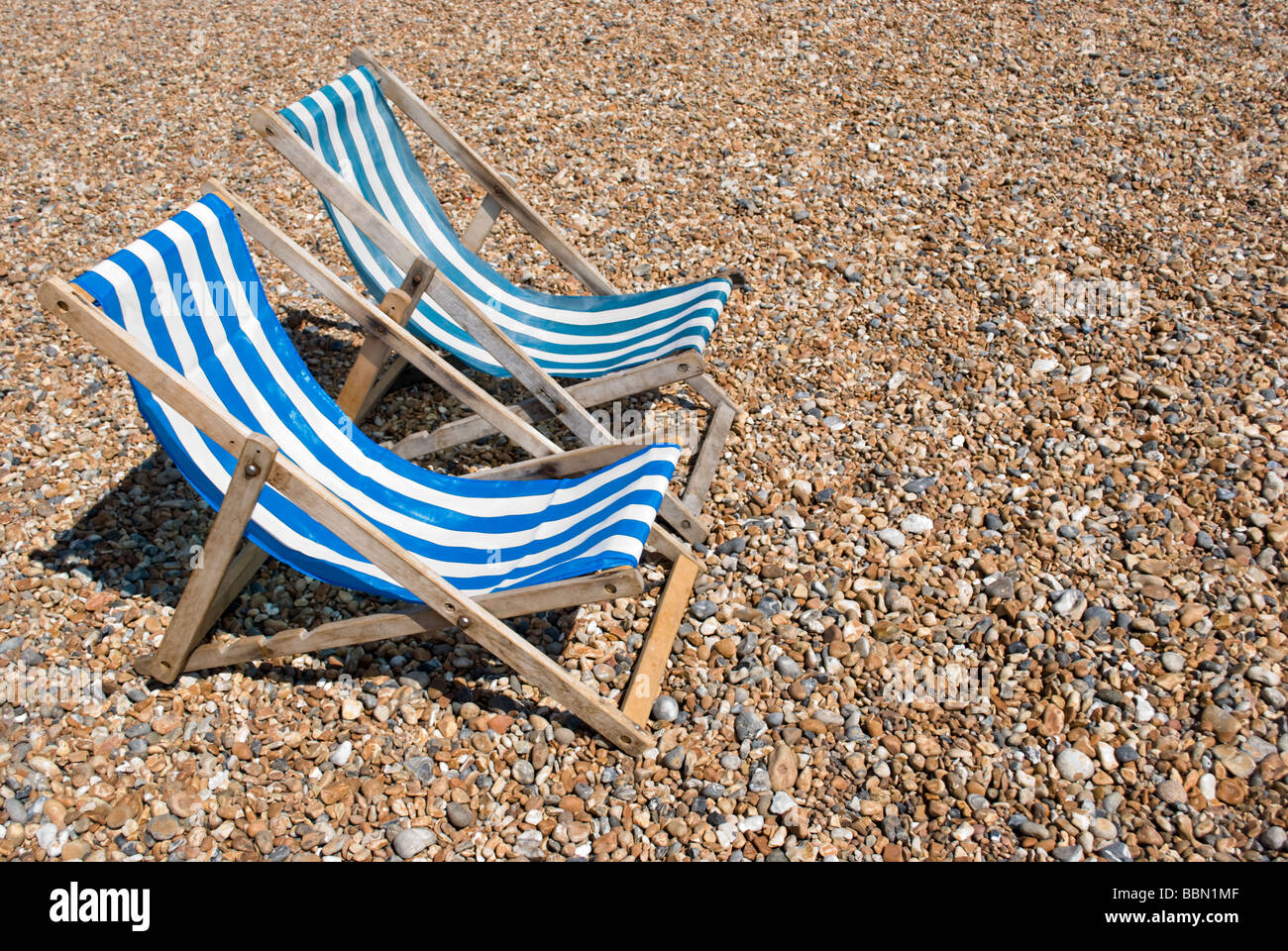 Brighton seafront deck chairs hi-res stock photography and images - Alamy