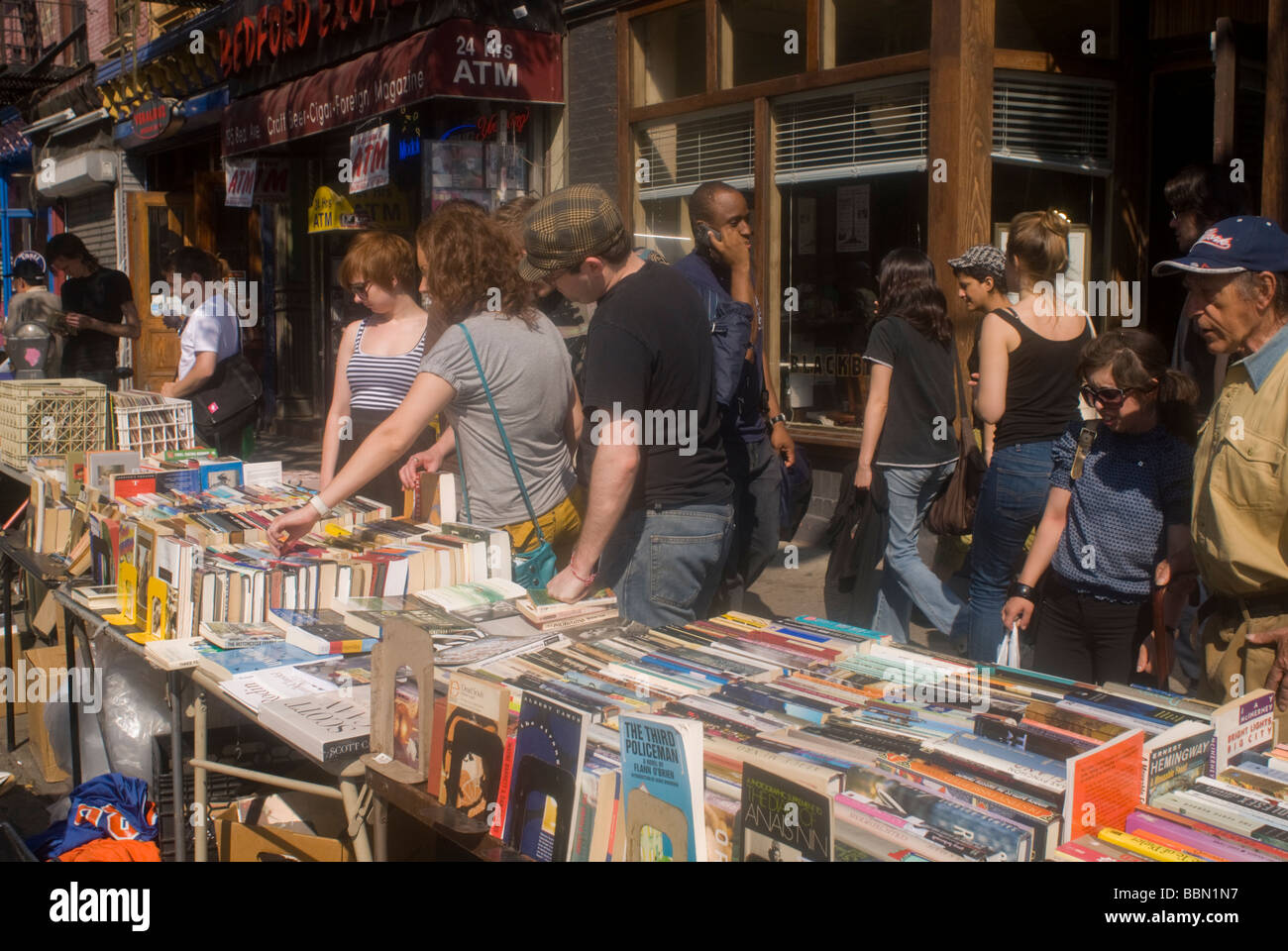 Visitors and residents of Williamsburg Brooklyn in New York take advantage of Willie Walks on Bedford Avenue Stock Photo