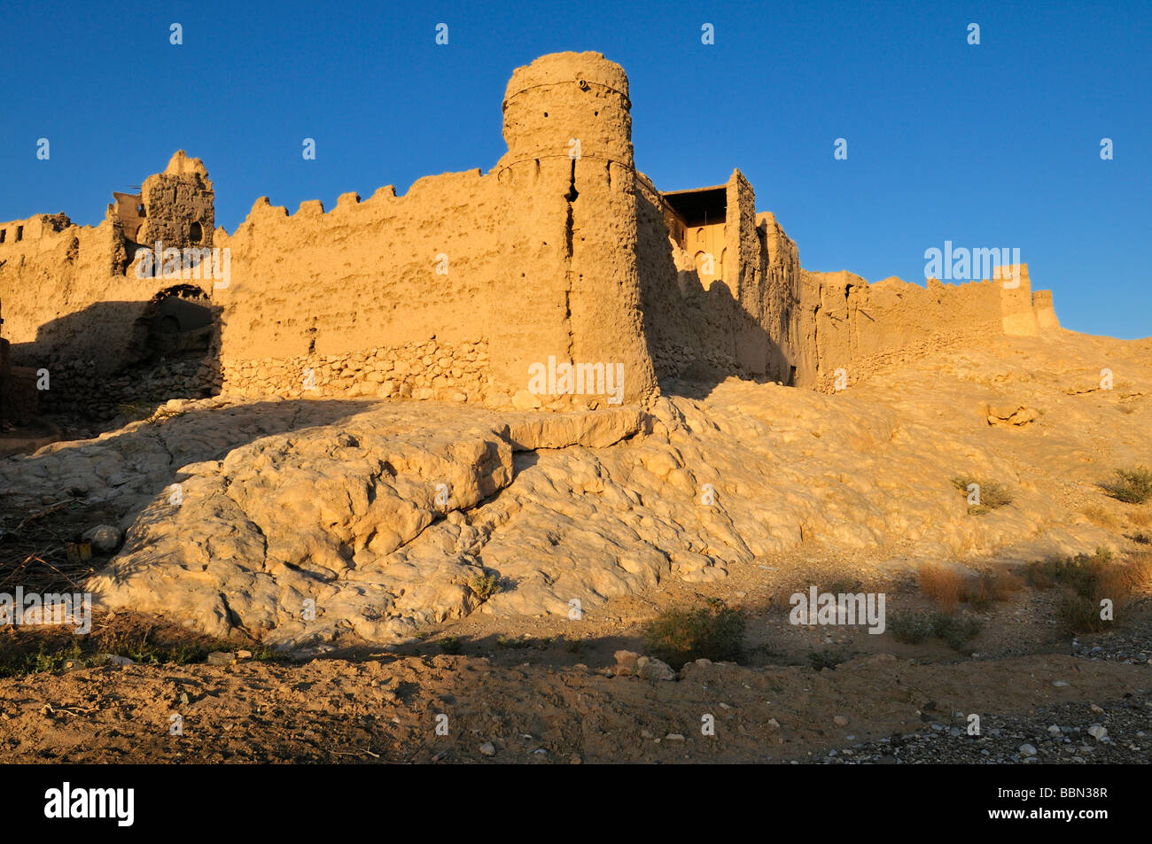 Ruin of the historic adobe city wall of Al Sulaif near Ibri, Hajar al Gharbi Mountains, Al Dhahirah Region, Sultanate of Oman,  Stock Photo