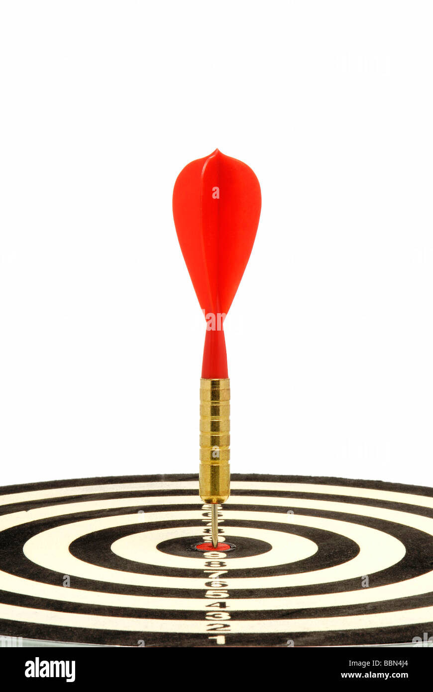 Red dart hit the target, a symbolic image for a direct hit Stock Photo