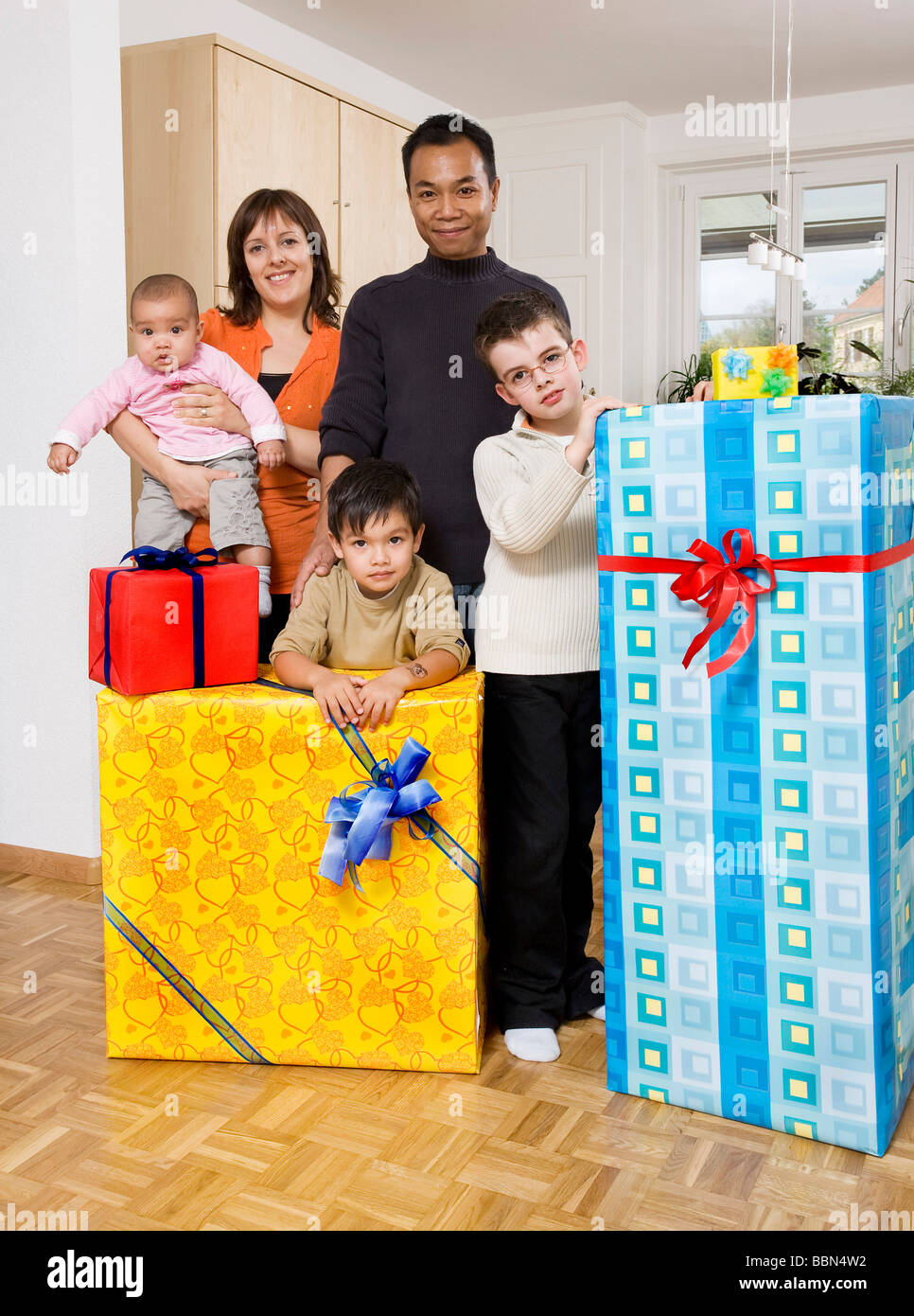 Family with gifts, Basel, Switzerland, Europe Stock Photo