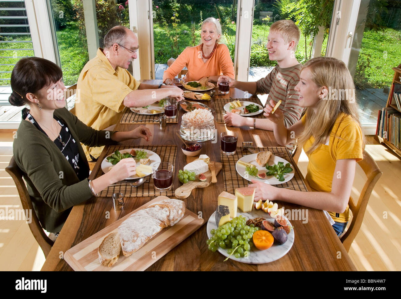 Swiss family enjoying Sunday Brunch together Stock Photo