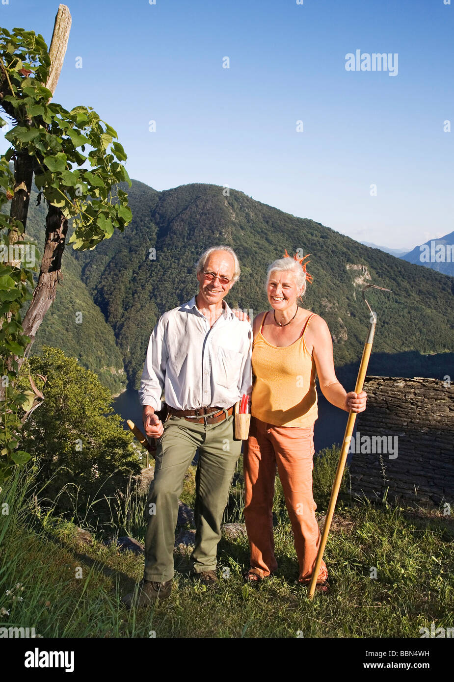 German-Swiss couple, growers of biodynamic wine, fruit and vegetables, Mergoscia, Ticino, Switzerland, Europe Stock Photo