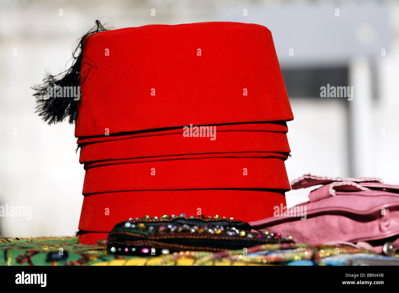 Traditional Turkish Fez, stacked for sale to tourists, Bazaar, Istanbul, Turkey Stock Photo