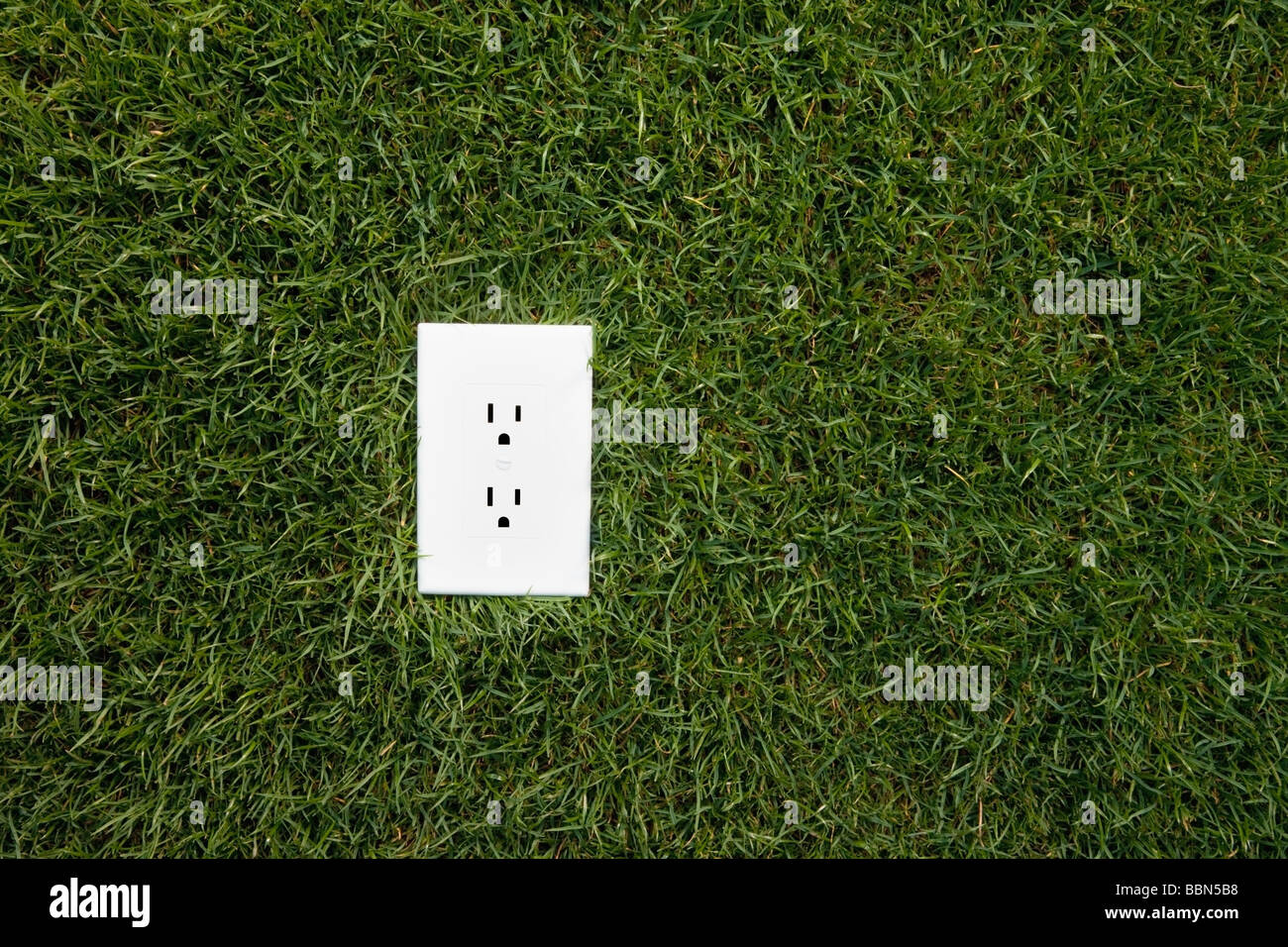 Electrical outlet in grass alternative energy source Stock Photo Alamy