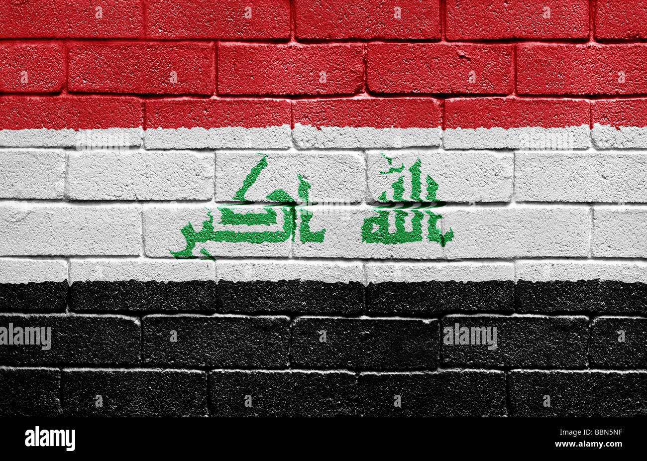 Flag of Iraq on brick wall Stock Photo