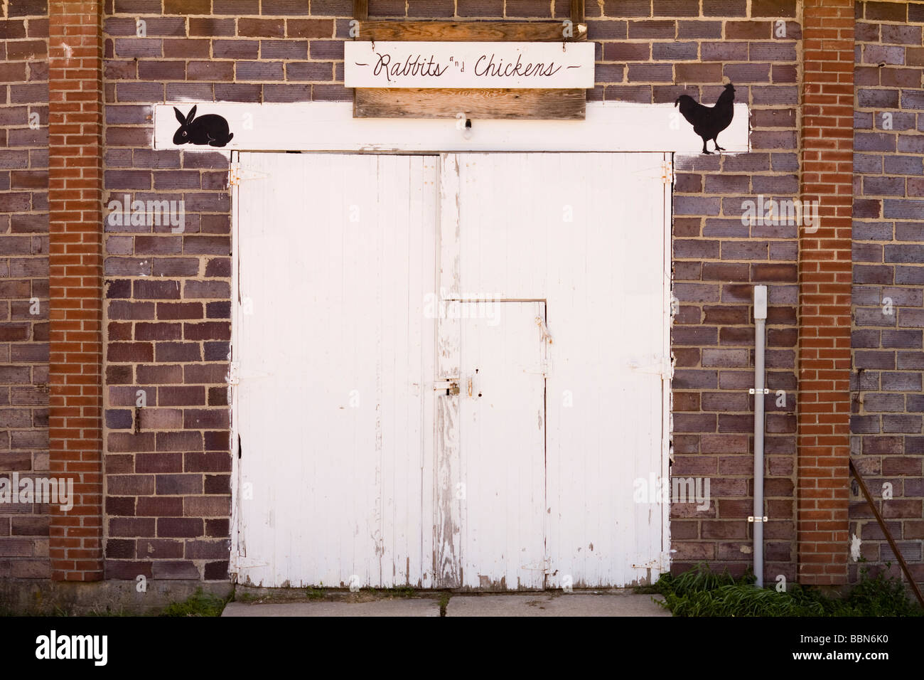 Main entry to livestock exhibition round barn building, Fayette County Fairgrounds, West Union, Iowa, USA Stock Photo