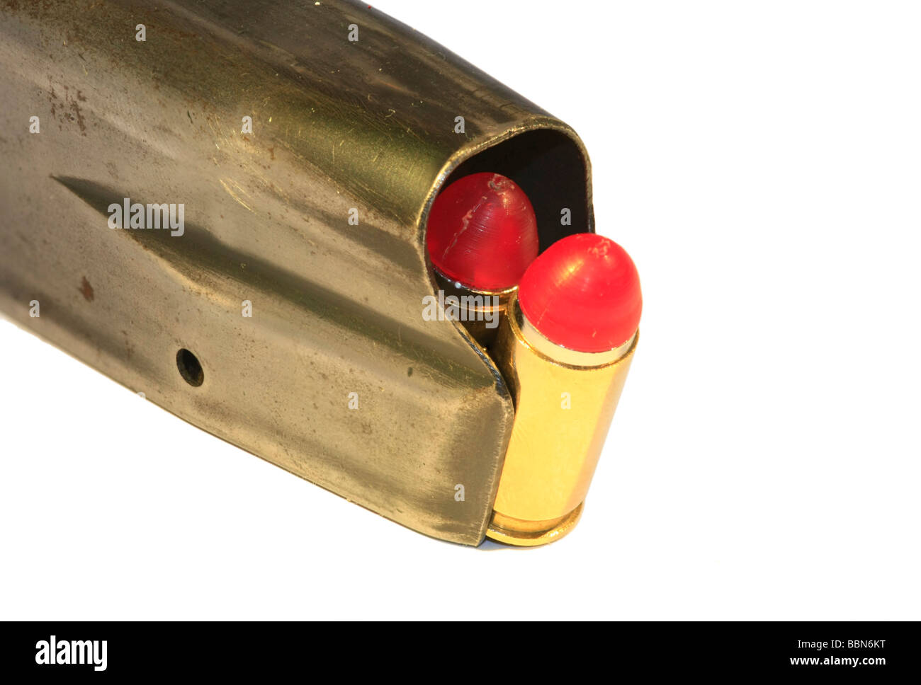 9mm Parabellum bullets in a magazine, isolated on white Stock Photo