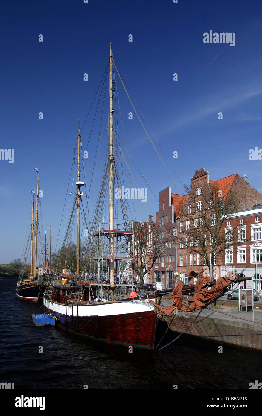 Hanseatic mansions and former warehouses at the Trave river, museum ship, Hanseatic City of Luebeck, Schleswig-Holstein, German Stock Photo