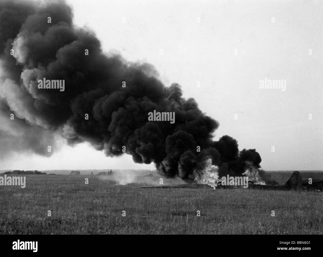 events, Second World War / WWII, aerial warfare, aircraft, crashed / damaged, burning remains of two German planes that collided during takeoff, Eastern Front, 13.7.1941, fuselage of a close reconnaissance aircraft Focke-Wulf 189 'Uhu', Stock Photo