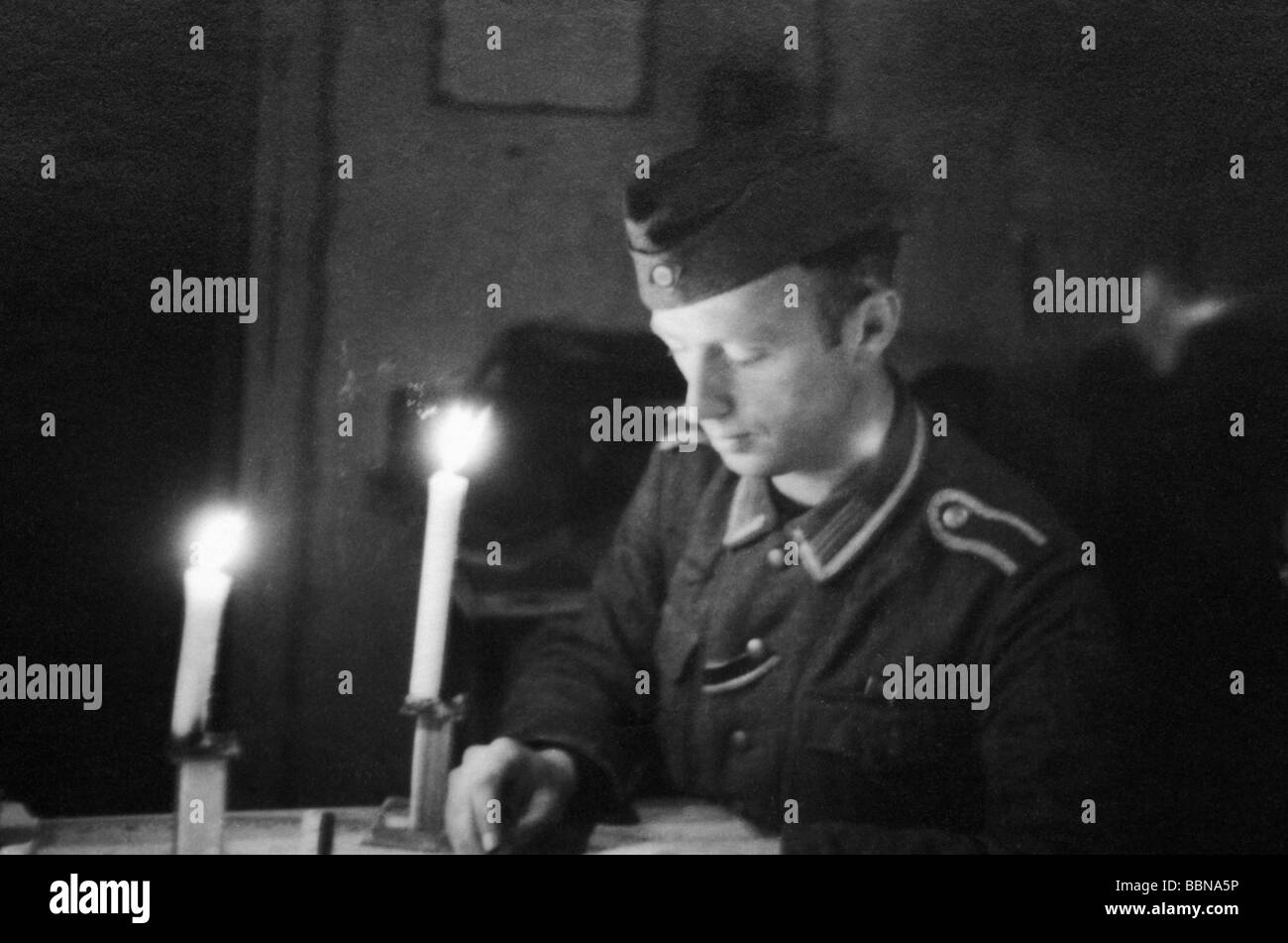 events, Second World War / WWII, Russia 1944 / 1945, Crimea, Sevastopol, German NCO writing at his quarters, April 1944, Wehrmacht, military, Third Reich, Soviet Union, USSR, Ukraine, Eastern Front, 20th century, historic, historical, Germany, soldiers, soldier, candles, candle, candlelight, candle-light, light, 1940s, people, Stock Photo