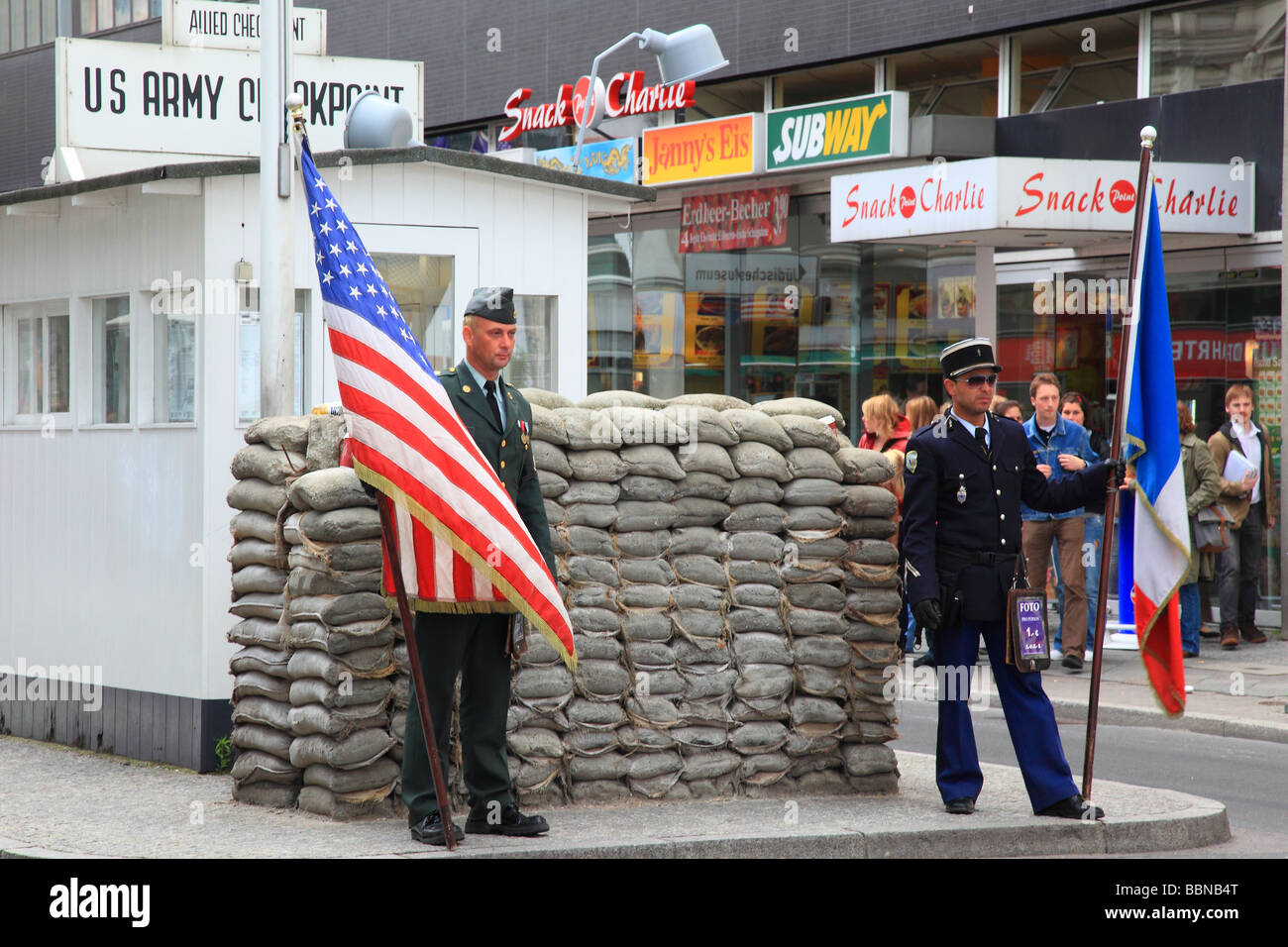 American and French soldier at Check Point Charlie Berlin Germany Europe Stock Photo