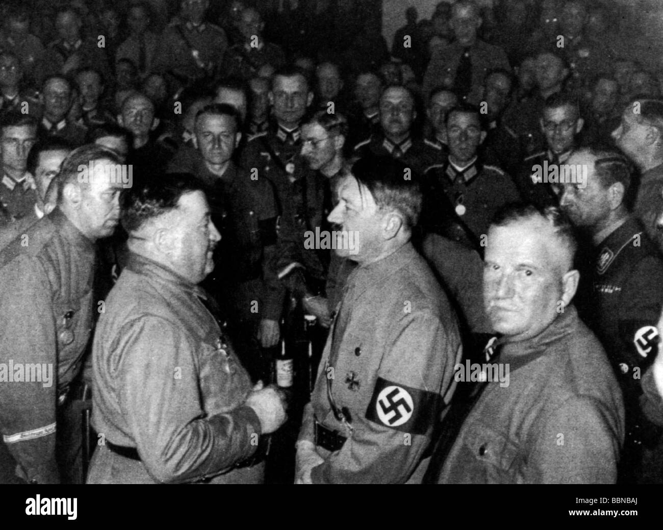 Hitler, Adolf, 20.4.1889 - 30.4.1945, German politician (NSDAP), Fuehrer and Reich Chancellor since 1933, half length, meeting of the 'Old Comrades' at the Loewenbraeukeller, Munich, late 1930s, Stock Photo
