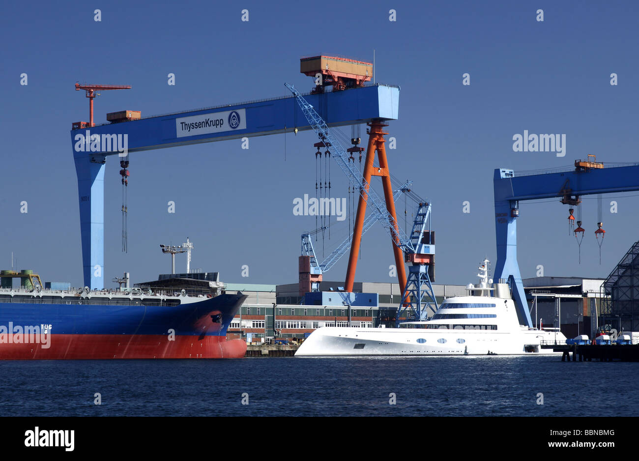 Luxury yacht in the dock of the Howaldtswerke Deutsche Werft shipyard, Kiel, Schleswig-Holstein, Germany, Europe Stock Photo