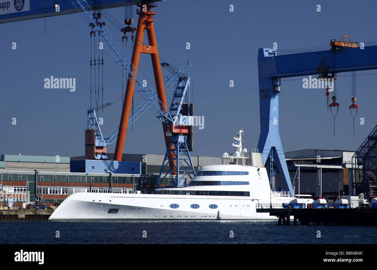 Luxury yacht in the dock of the Howaldtswerke Deutsche Werft shipyard, Kiel, Schleswig-Holstein, Germany, Europe Stock Photo